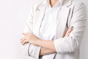 Close-up of female body with arms crossed photo