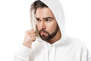 Handsome man wearing  white hoodie on white background photo