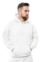 Handsome man wearing white blank hoodie on white background photo