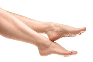 Female feet with smooth soft skin after hair removal treatment photo