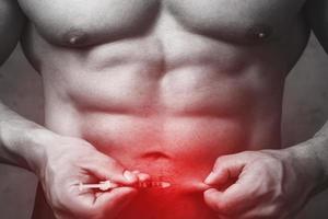 Bodybuilderprepared to make subcutaneous injection in the belly photo