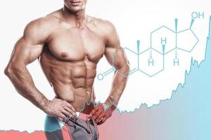 Shredded male torso and testosterone formula. Concept of hormone increasing methods or anabolic steroids usage. photo