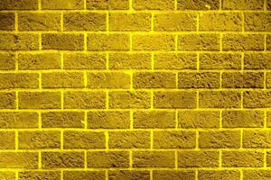 Shiny gold brick wall texture,abstract background,golden pattern photo