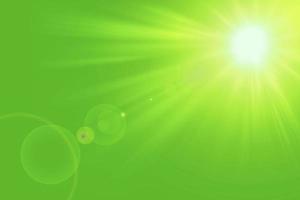 Natural green background with summer sun and lens flare. Sunlight on green natural background. photo