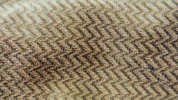 la textura de la tela marrón como fondo foto