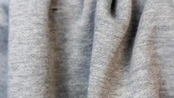 la textura de la tela de algodón gris como fondo foto