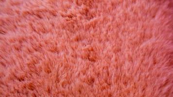 textura de lana rosa como fondo foto