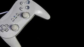 white joystick isolated black background photo