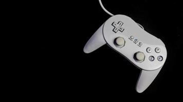 white joystick isolated black background photo