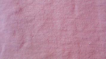 pink cloth texture as background photo