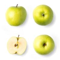 green apple with dew and water droplets on a white background. healthy fruit photo
