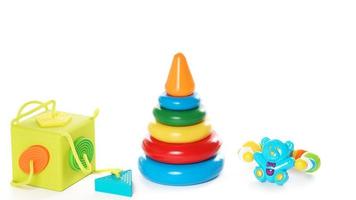 Collection of colorful plastic toys for little kids. photo