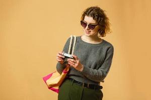 Travel and Lifestyle concept Full length studio portrait of pretty young student woman photo