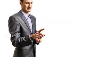 people, business and gesture concept - close up of man pointing finger to to something photo