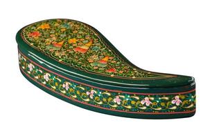 A closeup of a casket with an artistic painting on a white background. Central Asia, Uzbekistan photo