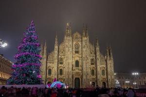Italy 2022 Illuminated christmas tree at the entrance to the vittorio emanuele gallery in Milan photo