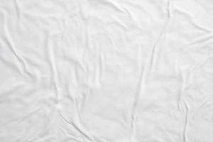 white crumpled and creased paper poster texture background photo