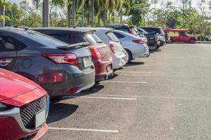 Cars parked in the outdoor parking lot photo