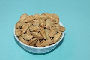 Different dried fruits and nuts on white background, top view. Space for text photo