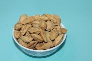Different dried fruits and nuts on white background, top view. Space for text photo