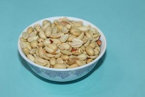 Different dried fruits and nuts on white background, top view. Space for text photo