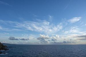 Beautiful clouds over the ocean photo