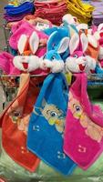 New Year and Easter design of Colorful fluffy hand Towels with rabbits photo