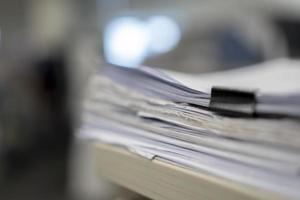 Stack of paper, Document, many jobs waiting to be done on the table, busy concept photo