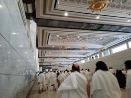 Mecca, Saudi Arabia, Dec 2022 - Pilgrims at Masjid al-Haram, Mecca, heading towards the hills of Safa and Marwah. photo
