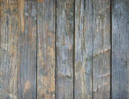 quema la textura de madera negra. tablón antiguo fondo de pared foto