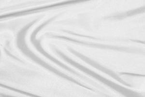 Smooth elegant white silk fabric or satin luxury cloth texture for drapery luxurious abstract design background photo