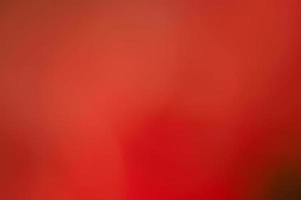 Abstract red defocused background. Blurred background red with black. photo