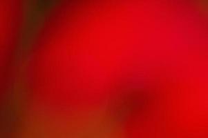 Abstract red defocused background. Blurred background red with black. photo