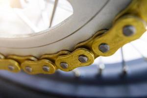 gold chain motorcycle close-up macro photo