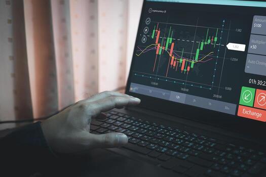 planning and strategy, Stock market, trader or investor working at home. Technical price graph and indicator, red and green candlestick chart and stock trading computer screen background photo