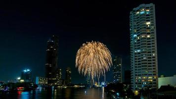 fireworks on the river in the dark sky photo