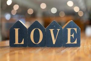 Word love. Love blocks. The word love formed with small wooden blocks. photo