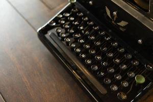 vintage typewriter keys with selective focus. Antique Typewriter. Vintage Typewriter Machine Closeup Photo. photo