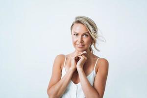 Portrait of blonde hair young woman isolated on white background photo