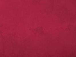 Perfect background with space in color Viva magenta rustic and dirty texture for cosmetic or makeup. photo