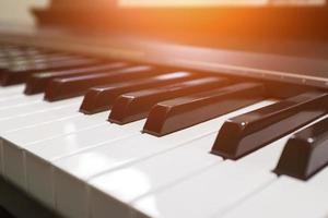 Keyboard synthesizer. Piano keyboard with selective focus. Classic piano. photo