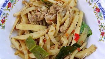 Close Up Thai street food ,Stir-fried spicy bamboo shoots with white background video