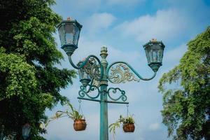 antique lamp on Malioboro street Yogyakarta, a very iconic street lamp, along Malioboro street, Yogyakarta city Indonesia. photo