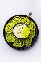 Rabdi Jalebi - Green jilebi or imarati with Rabri made from condensing milk, Indian dessert photo