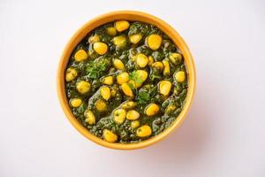 Palak sweet corn sabzi also known as Spinach Makai curry sabji, north Indian main course menu photo