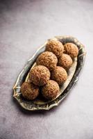 Alsi pinni laddu or flax seed laddo or healthy jawas ladoo are delicious Indian sweet energy balls photo