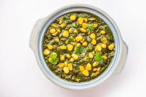 Palak sweet corn sabzi also known as Spinach Makai curry sabji, north Indian main course menu photo