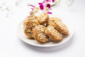 Amrit peda or Amrut pedha or pera is an Indian sweet made from milk and sugar with coconut topping photo