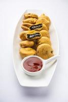 chocolate biscuit pakora, pakodas or fritters, creative Indian teatime snack photo