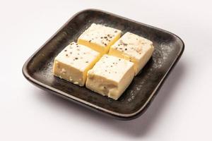 Kharvas or Cheek, Chik, Bari, Pis or Junnu is a sweet dairy product made from bovine colostrum photo